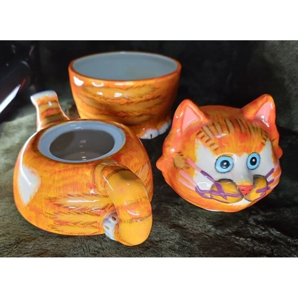 3 Piece‎ Teapot, Cat head as lid, Teapot, and Cup underneath. Unique